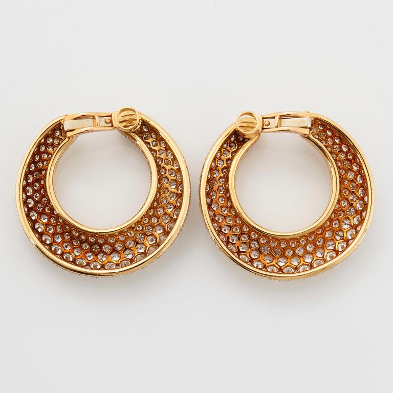 Cartier a pair of hoop earrings.