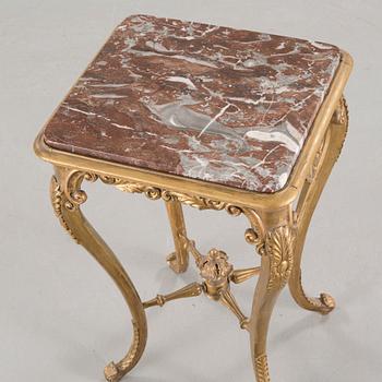 A rococo style side table, around the year 1900.