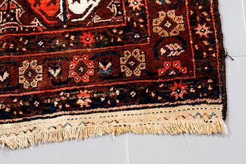 A SEMI ANTIQUE QUCHAN/KURDISH RUG, 248 x 134 cm.