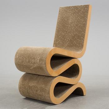 A 21 th century Frank O. Gehry "Wiggle Side Chair" for Vitra, Germany.