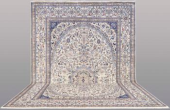 A CARPET, Nain part silk, s.k 9 LAA, 588 x 393 cm.