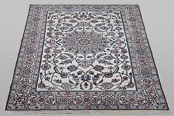 A carpet, Nain, part silk, 9 laa, ca 290 x 196 cm.