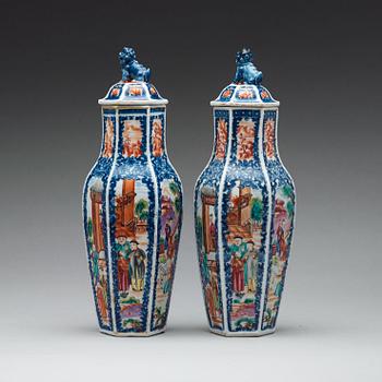 A pair of famille rose and underglaze blue vases with covers, Qing dynasty, Qianlong (1736-95).