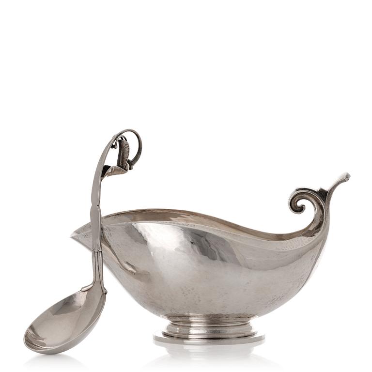 Georg Jensen, a sterling silver sauceboat and ladle, Copenhagen 1925-1945, design nr 98 and 141.