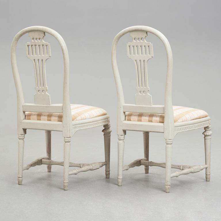 A pair of late Gustavian late 18th century chairs.