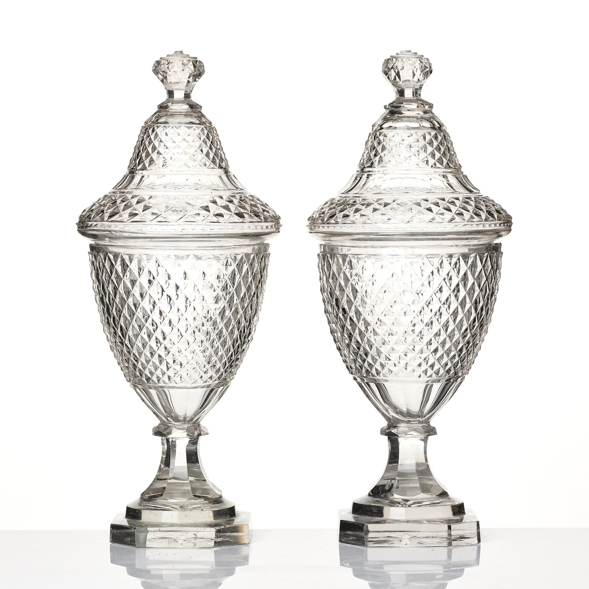 A pair of glass cups with covers, possibly Ireland, 19th century.
