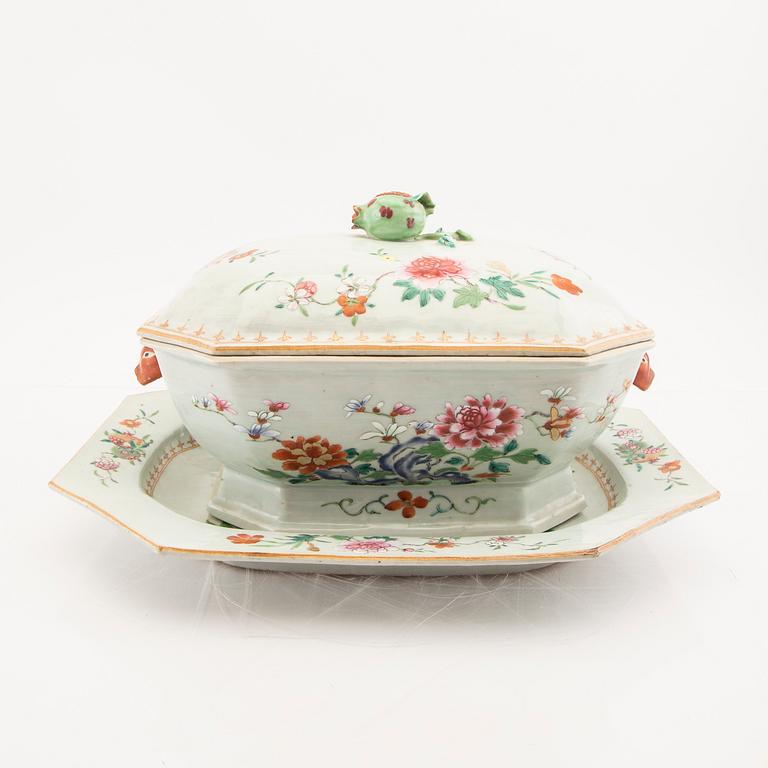 A Chinese famille rose tureen with cover and plate later part of the 18th century.