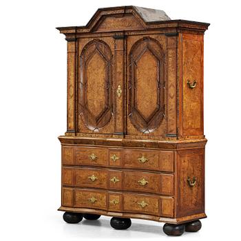 1. A Swedish late baroque burr-alder cabinet, first part 18th century.