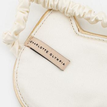 Charlotte Olympia, a pair of 'Cat nap' silk flats, a sleeping mask and a toilet bag, size S.