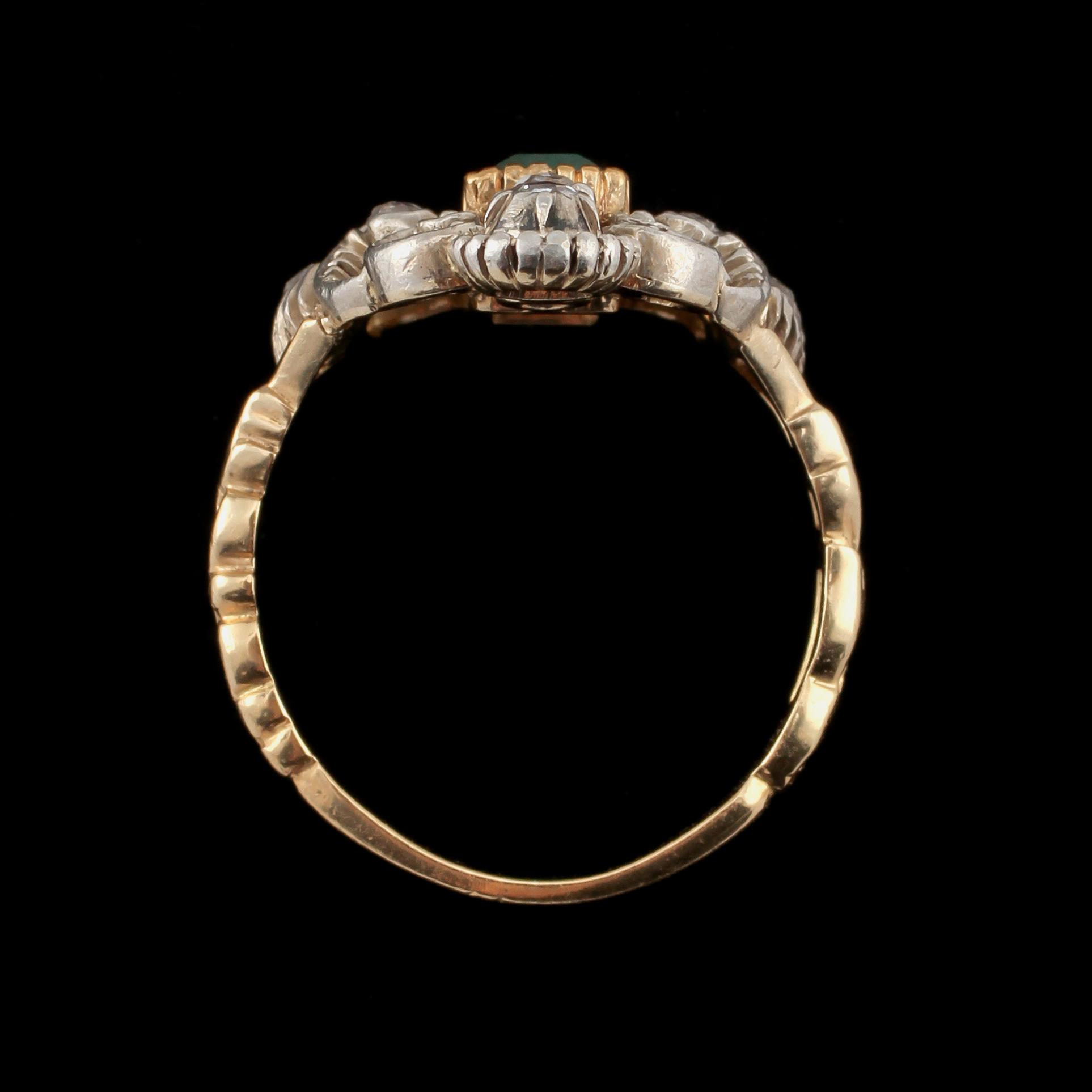 RING, 18k guld och silver, fasettslipad smaragd samt 10 rosenslipade diamanter, G Dahlgren & Co, Malmö, 1931. Vikt 6 g.