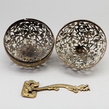 A Chinese bronze perfume ball, first half of the 20th century.