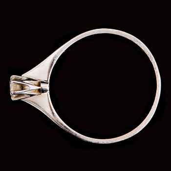 RING, 18 k vitguld med briljant 0.15 ct enligt gravyr. Vikt ca 2 gram.