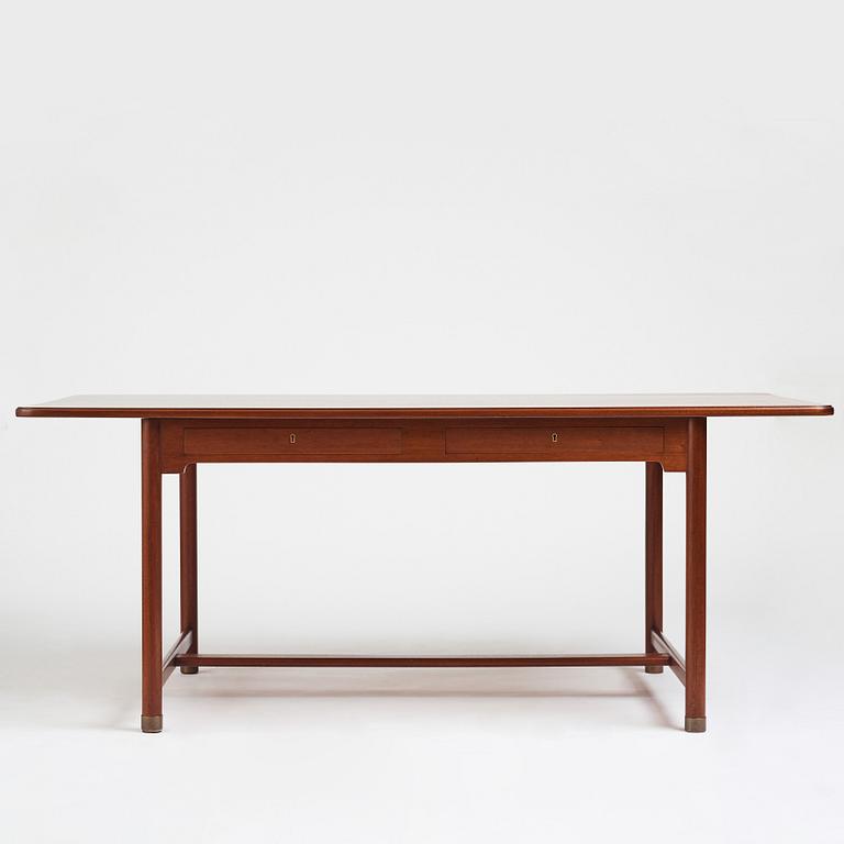 Mogens Koch, an important free standing mahogany desk by N.C. Jensen Kjær, Denmark 1930's.