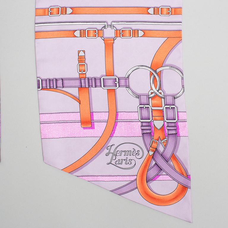 Hermès, a Maxi Twilly, 'Grand Manège' silk scarf.