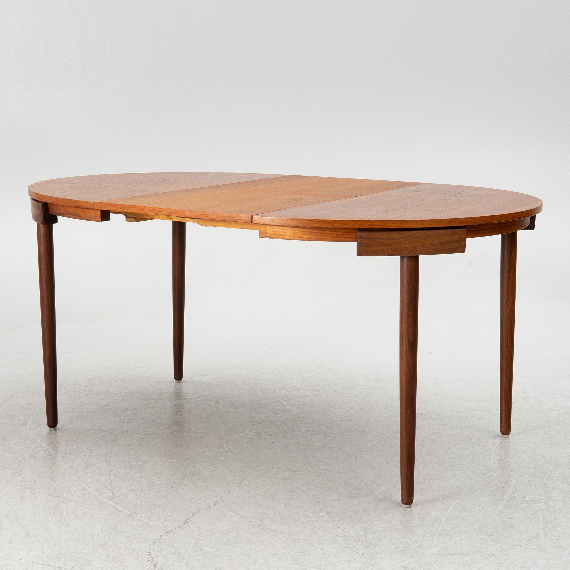 Hans Olsen, a dining table and four chairs, Frem Røjle, Denmark, 1950's.