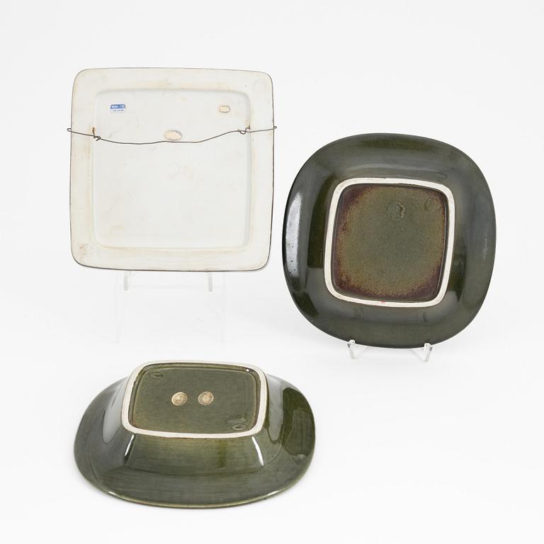 Lisa Larson, a group of three stoneware wall reliefs and two ashtrays, Gustavsberg.