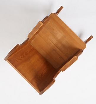 Nordiska Kompaniet, a Swedish Modern stained pine 'Lovö' rocking chair.