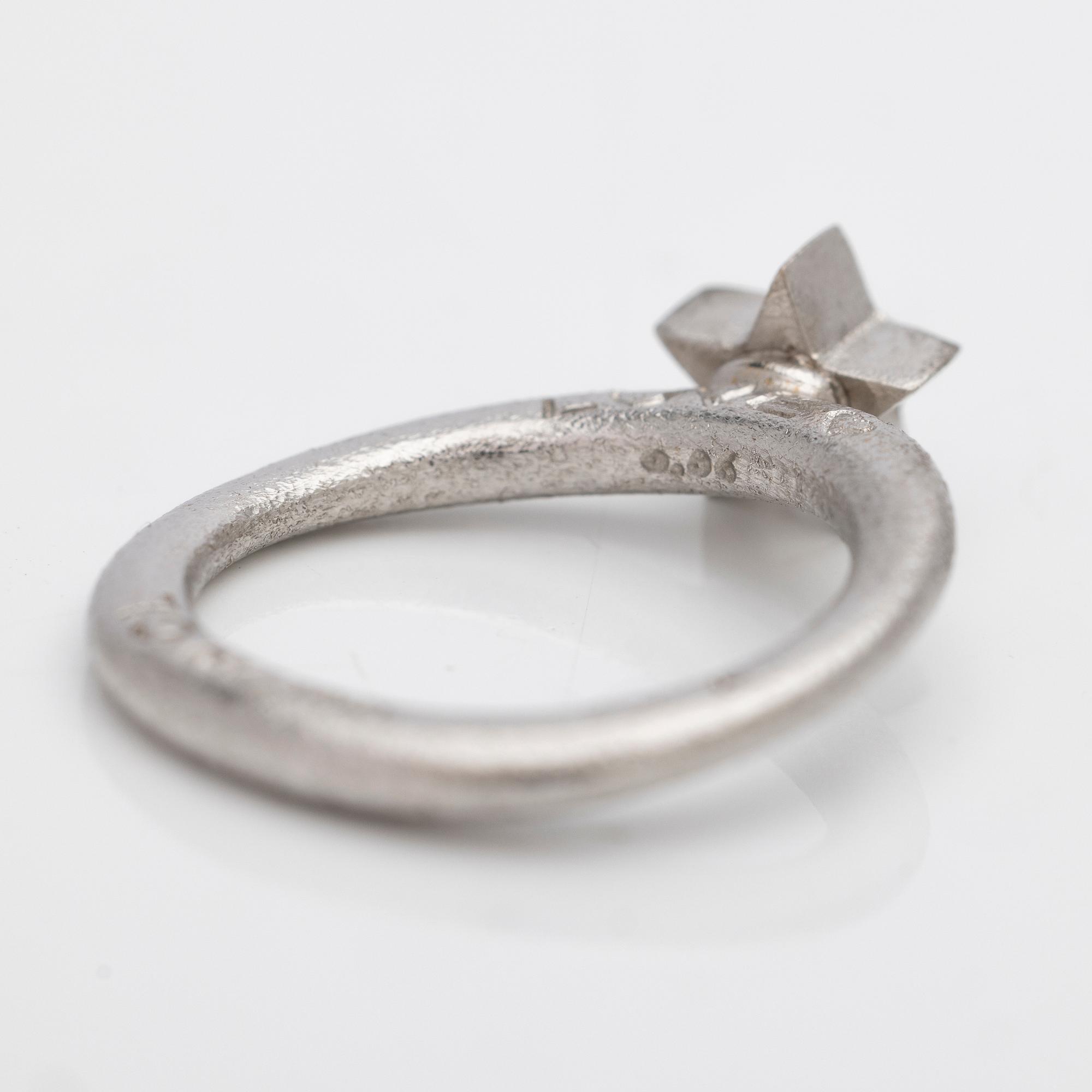 Ole Lynggaard, Ring, “Love”, 18K white gold with brilliant-cut diamonds, designed by Charlotte Lynggaard.