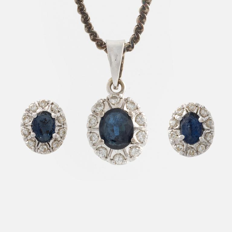 Pendant and a pair of earrings, white gold with sapphires and brilliant-cut diamonds.