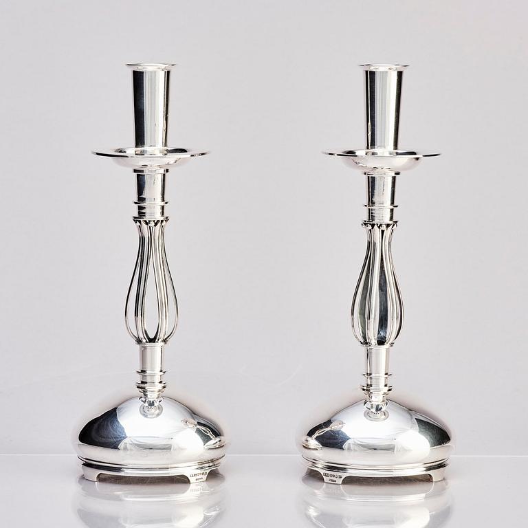 Nordisk Silverkonst, a pair of sterling silver candlesticks, Helsingborg 1950.