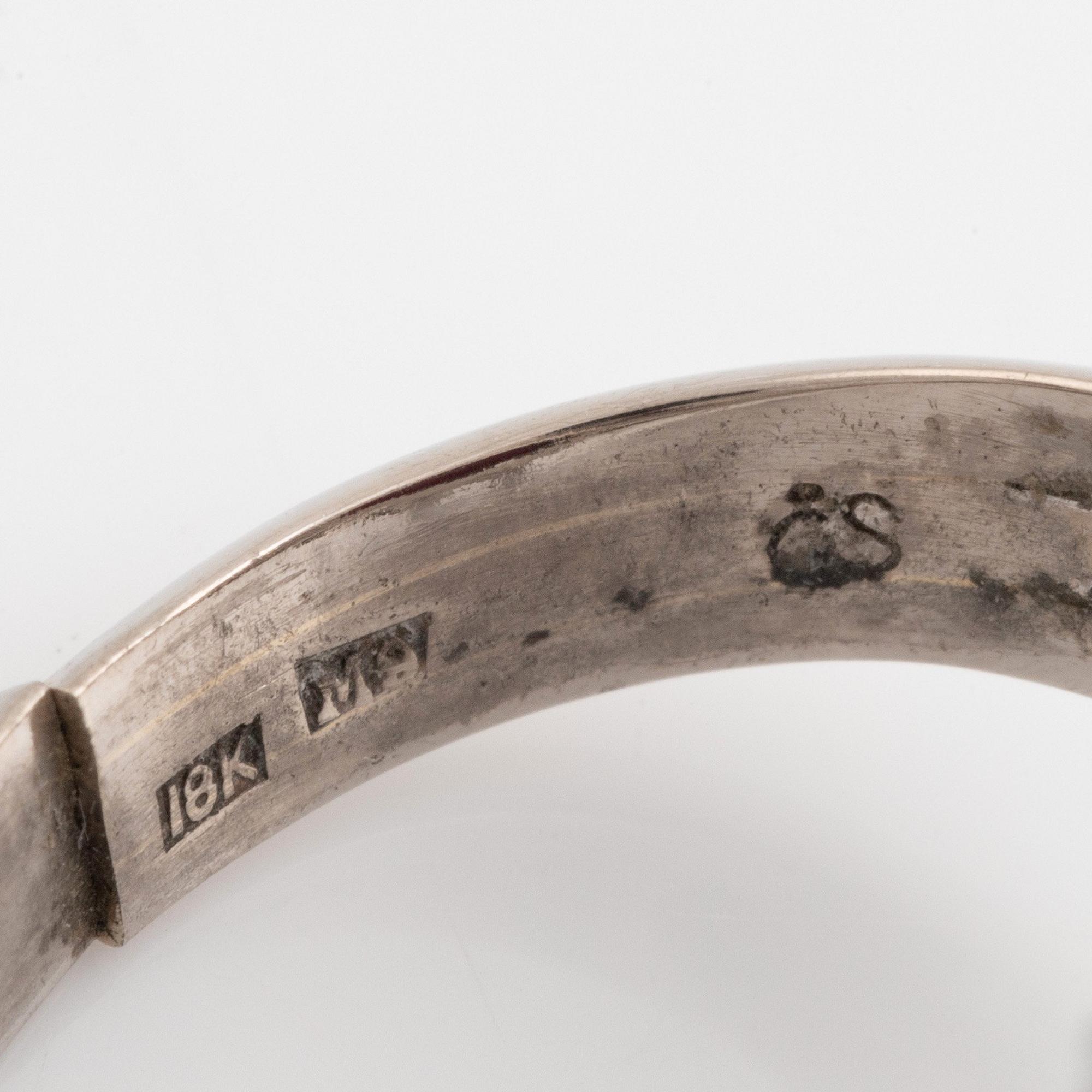 Ring, Strömdahls, with a cabochon-cut ruby and brilliant cut diamonds.