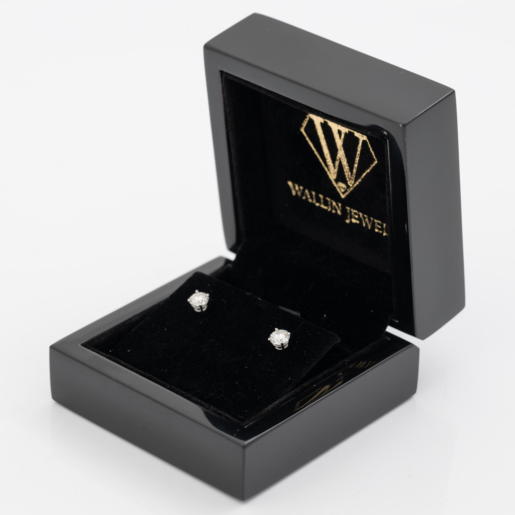 Earrings, a pair, 18K white gold set with round brilliant-cut diamonds totalling 1.03 ct, accompanied by a GIA dossier.