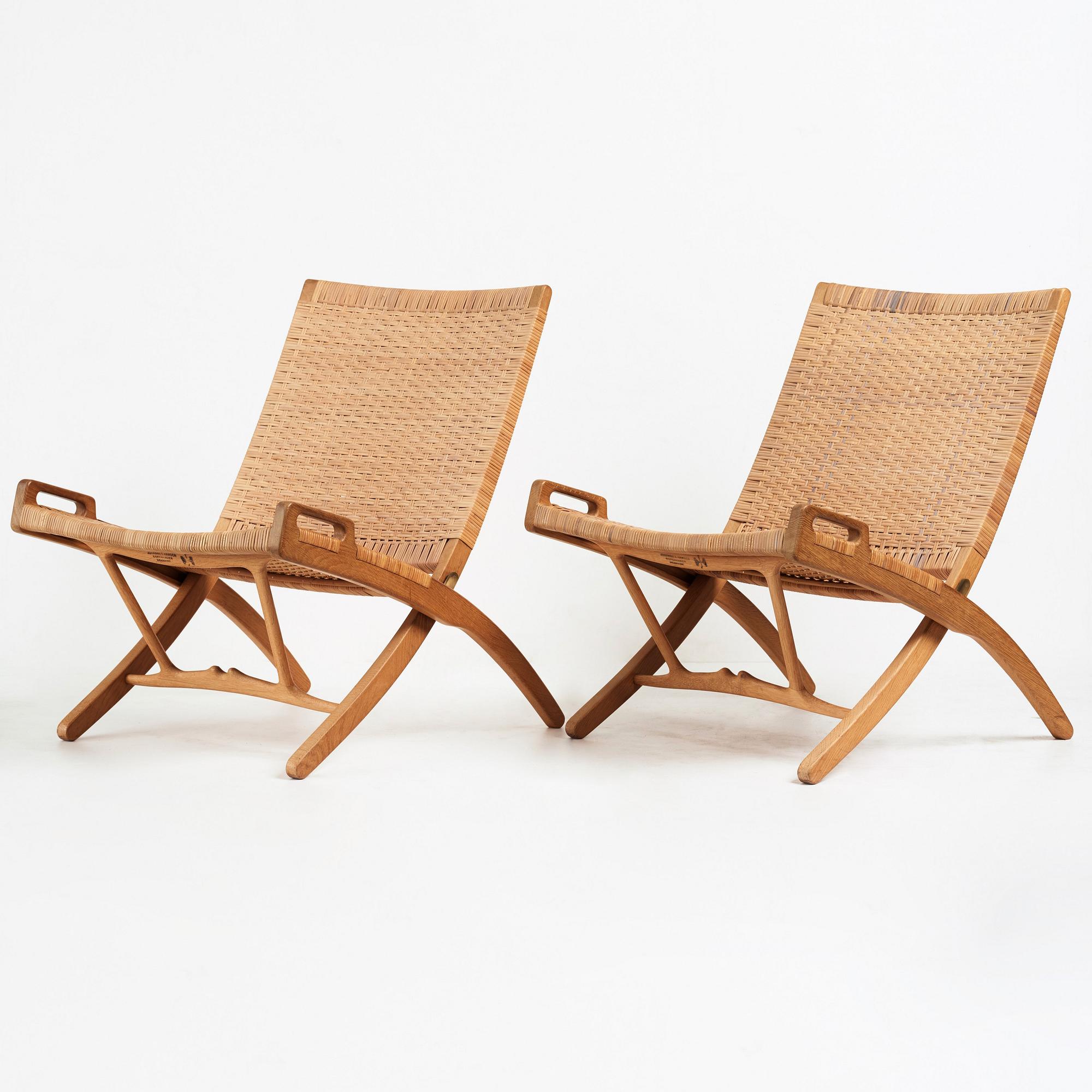 Hans J. Wegner, a pair oak and rattan "model 512" folding chairs by Johannes Hansen, Denmark 1950-60's.