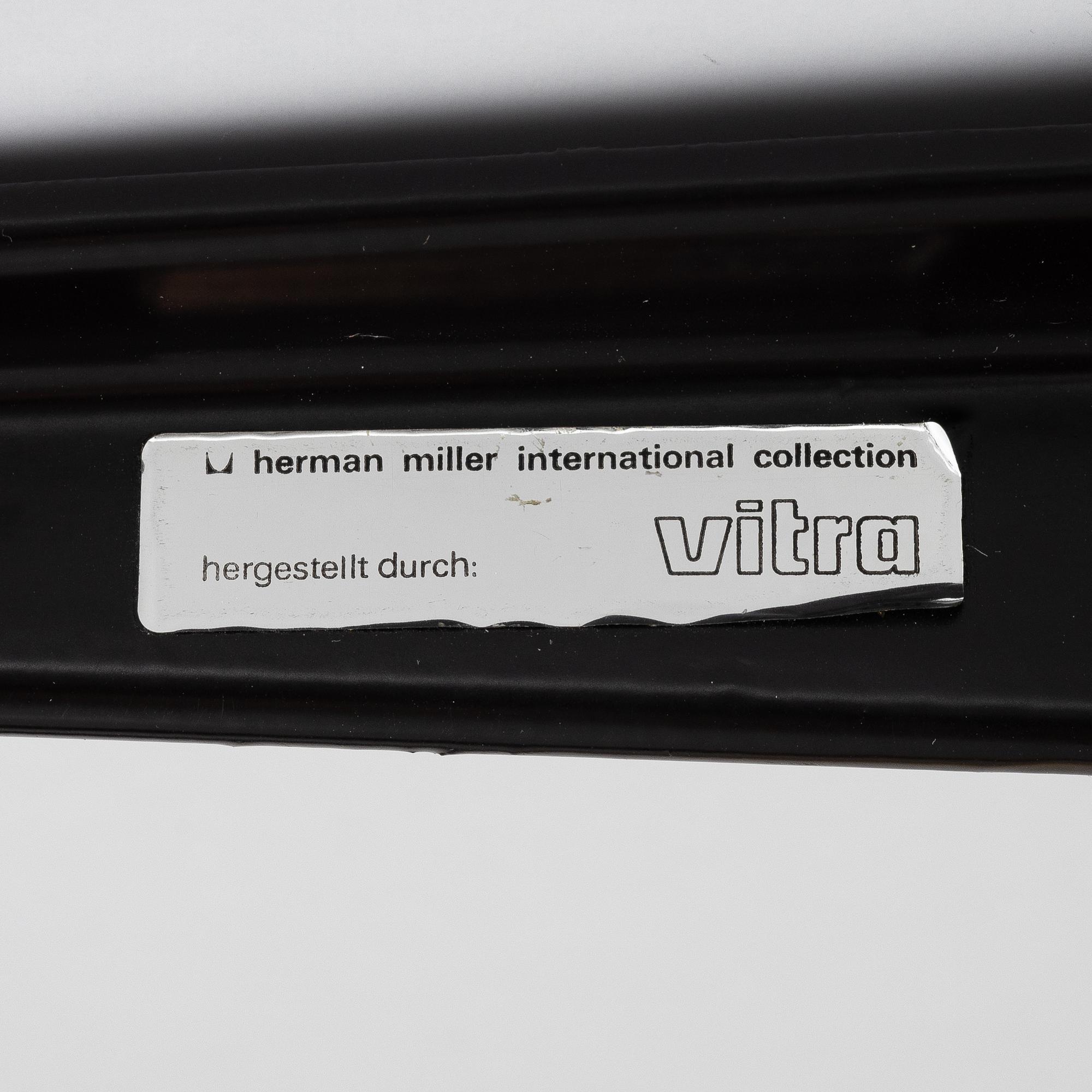 Charles & Ray Eames, A "Contract Base" table, Vitra, 2000s.