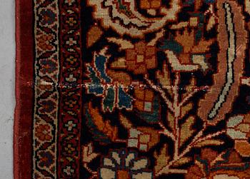 A carpet, antique Sarouk, ca 421-428 x 316-324,5 cm.