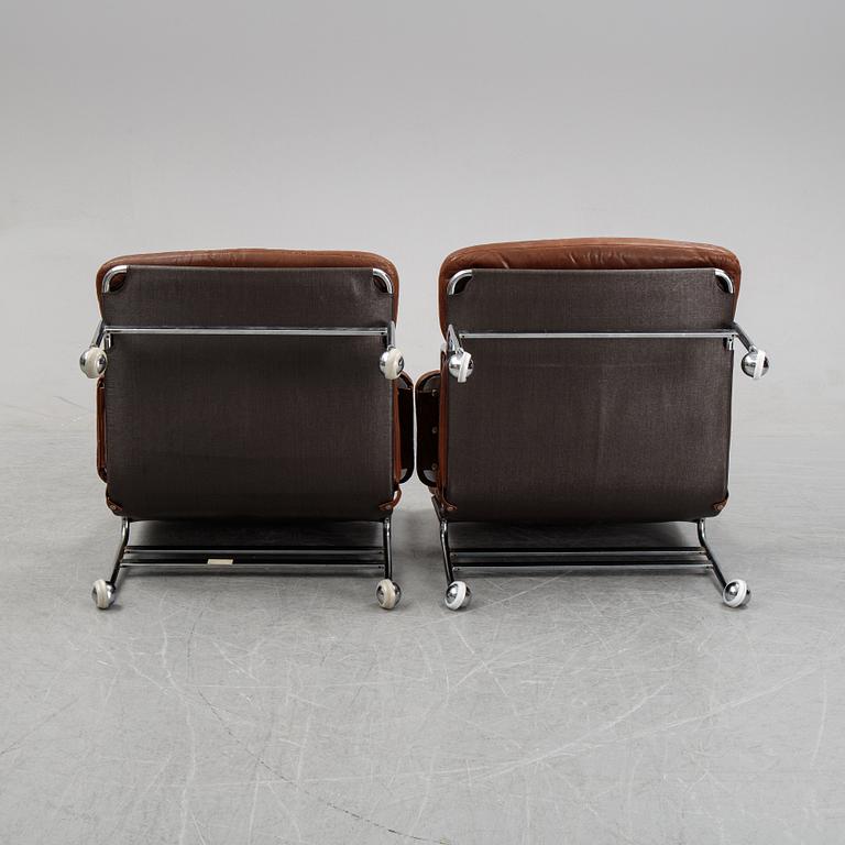 A pair of 'Karin' easy chairs by Bruno Mathsson for Dux, designed 1969.