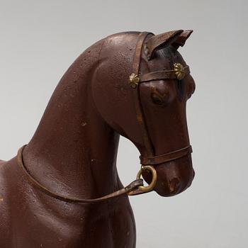 An early 20th century rocking horse.
