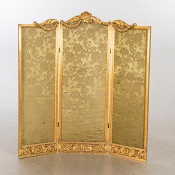 A Louis XVI-styel folding screen beginning of the 20th century.
