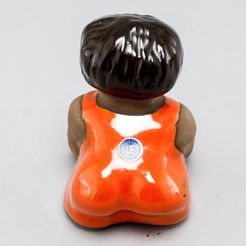 Eight stoneware figurines by Uppsala-Ekeby, from the latter half of the 20th century.