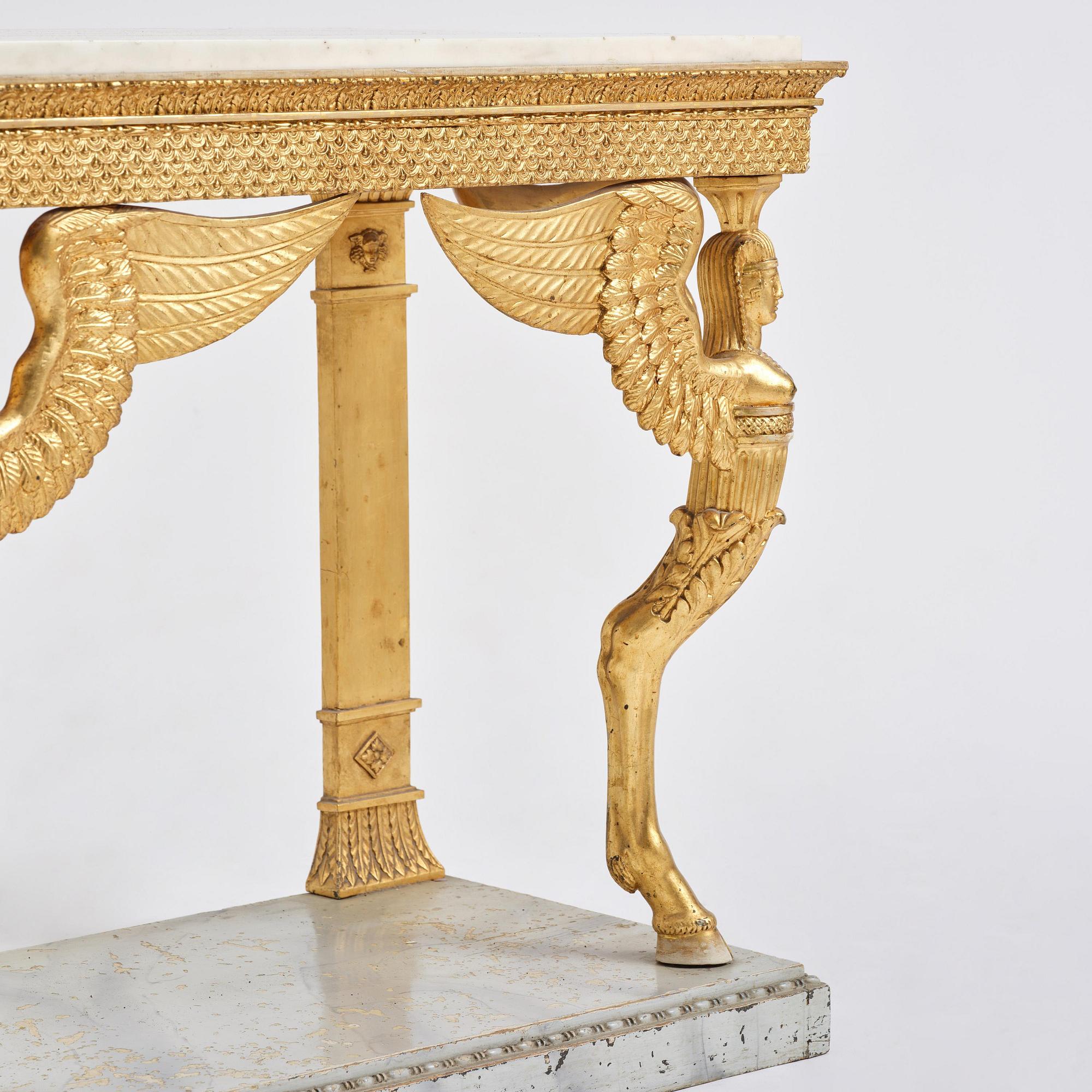 A late Gustavian giltwood console in the manner of J. Frisk, Stockholm, early 19th century.