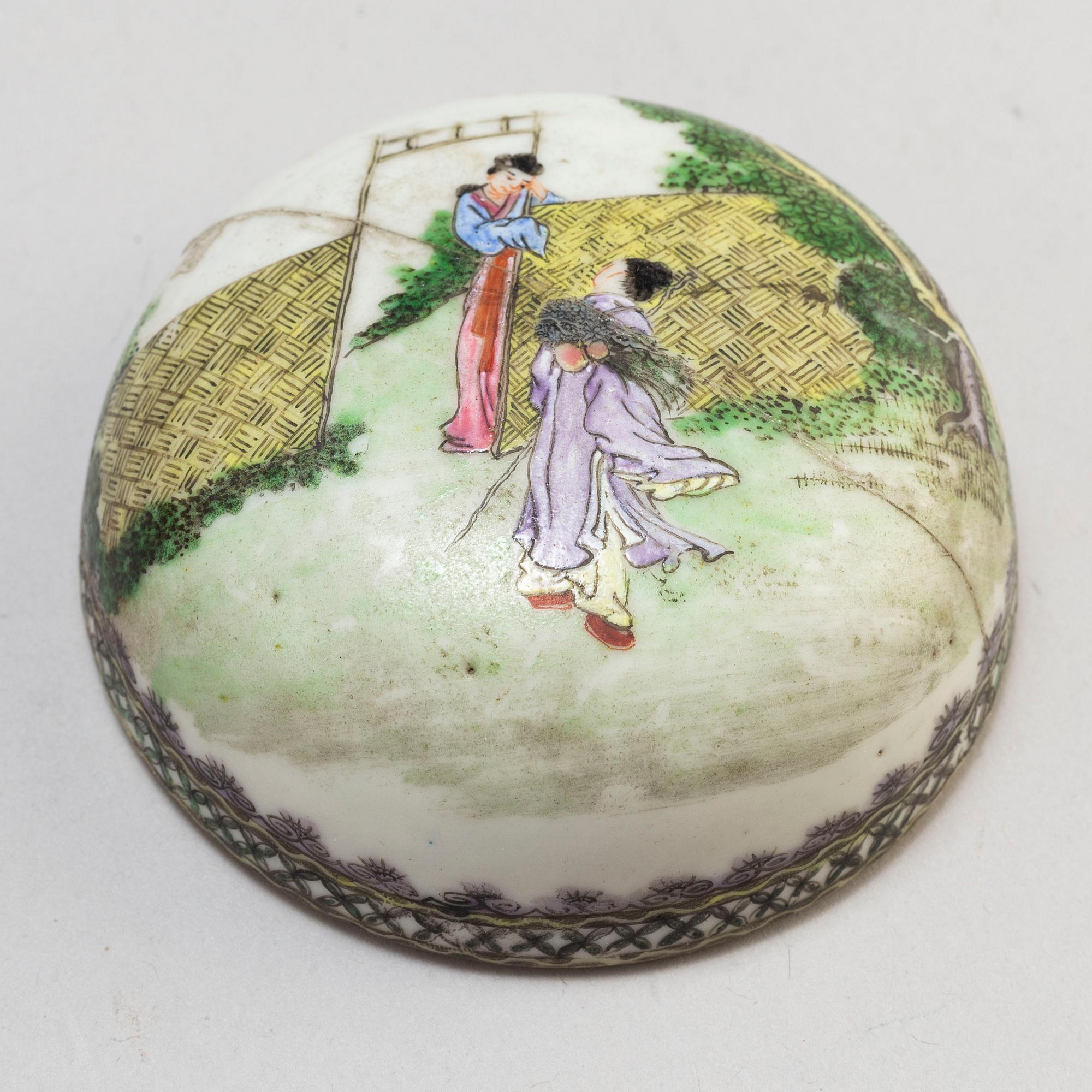 Two Chinese famille rose hat stands and a jar with cover, 20th century.
