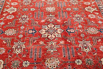 A Kazak carpet, c. 325 x 240 cm.