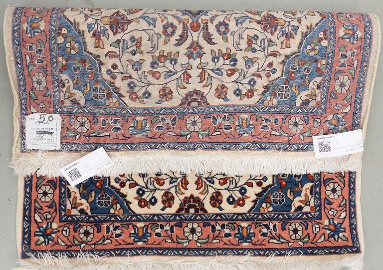 An old rug from Sarouk. Around 80 x 67 cm.