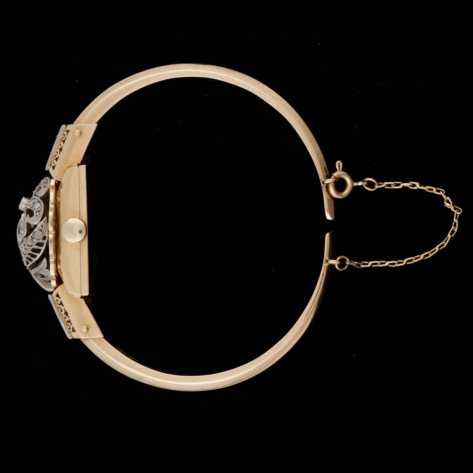 ARMBANDSUR, dam, 18k guld med rosenstenar, Vasa, 1960-tal. Vikt 23,4g.