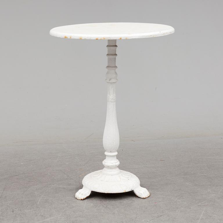 an early 20th century cast iron table.