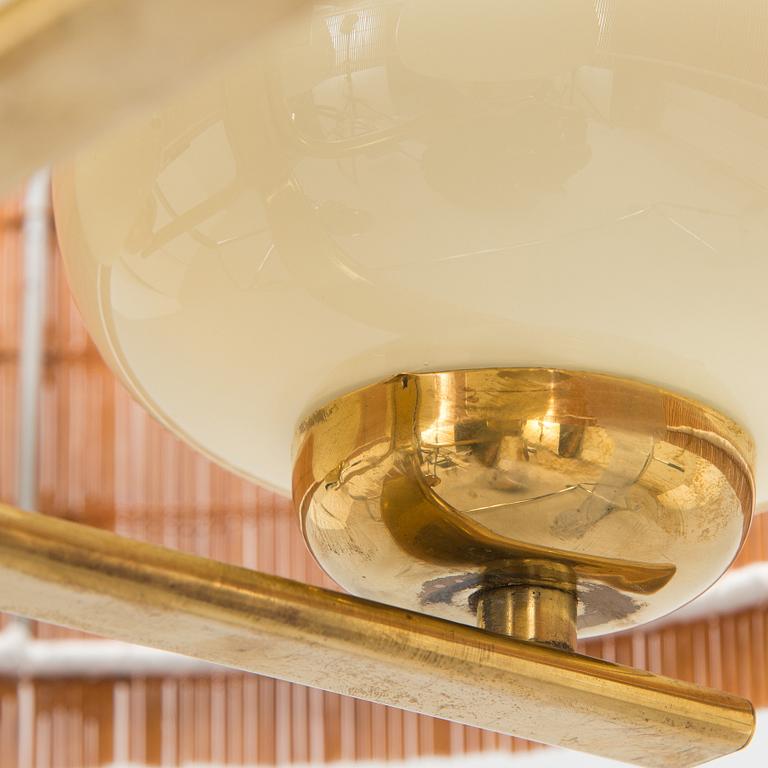 Paavo Tynell, kattovalaisin, malli 1359/4 Taito 1900-luvun puoliväli.