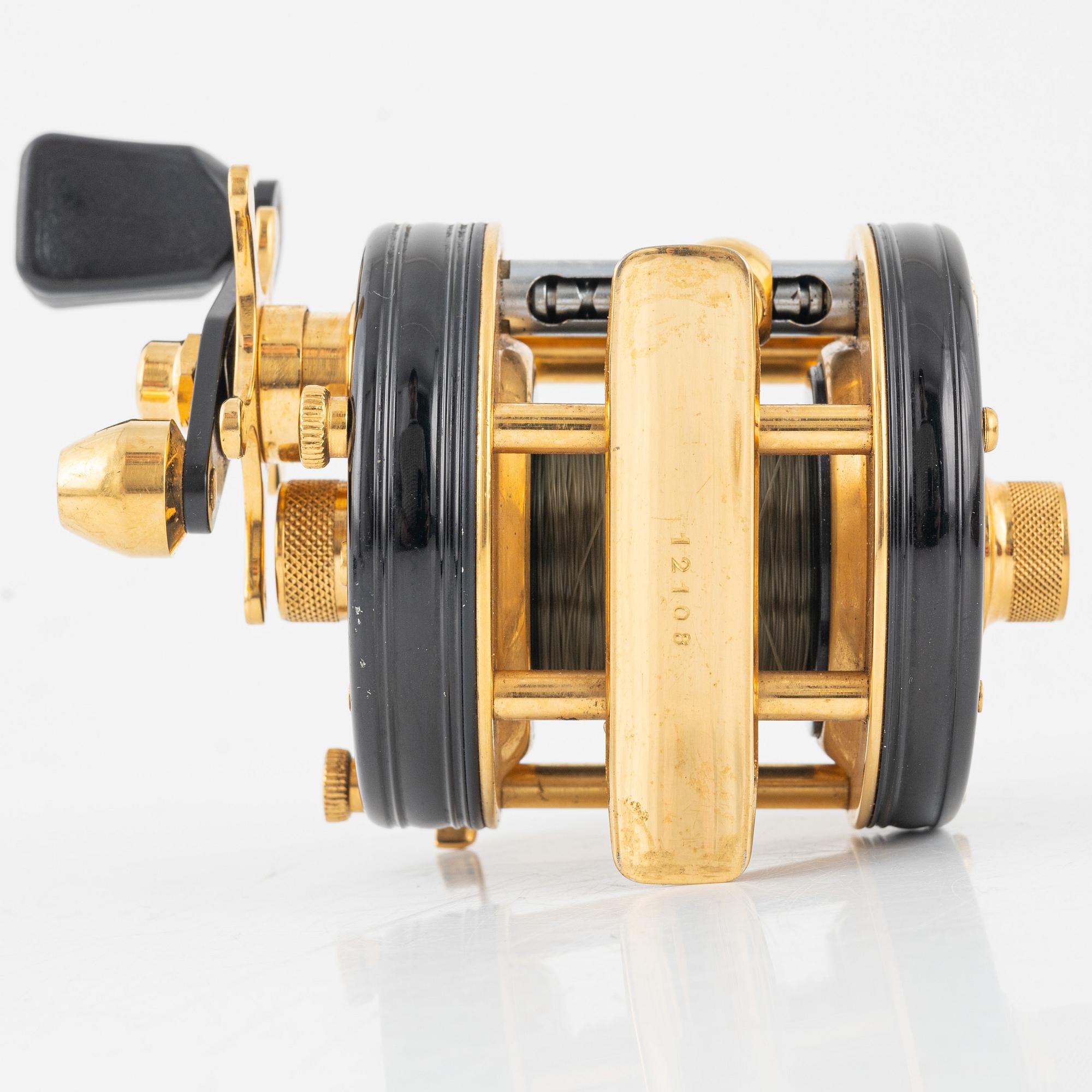 Vintage ABU Ambassadeur Deluxe 5000 fishing reel gold black