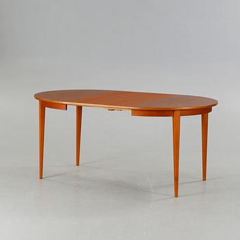 A dining table made in the middle of the 20th century.