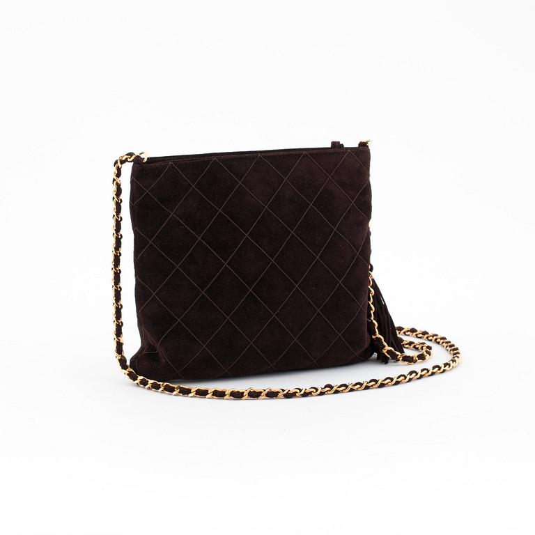 CHANEL, a brown suede cross body bag.