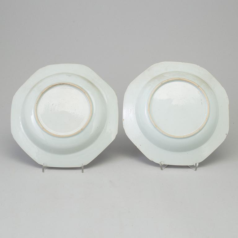 Two blue and white dishes and two cups with dishes, Qing dynasty, Qianlong (1736-95) and Kangxi (1662-1722).