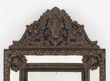 A 20th century Baroque style mirror, France.