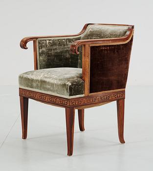 A Swedish palisander armchair with inlays of different woods, 1920's-30's.