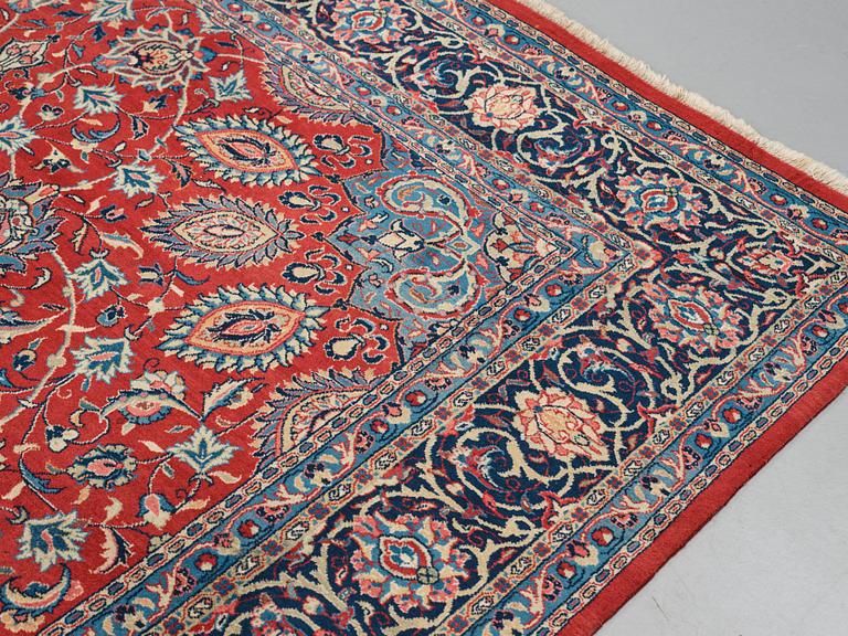 A carpet, a semi-antique/an old Persian, probably a Qazvin, ca 345-349 x 251,5-253 cm.