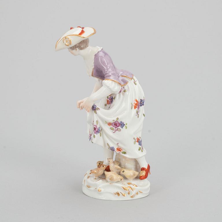 A FIGURINE.