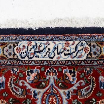 A Moud carpet, part silk, signed, c. 345 x 249 cm.