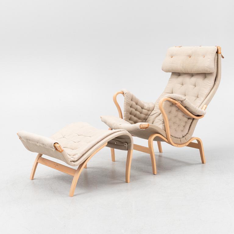 Bruno Mathsson, a 'Pernilla' armchair and a foot stool, Dux.